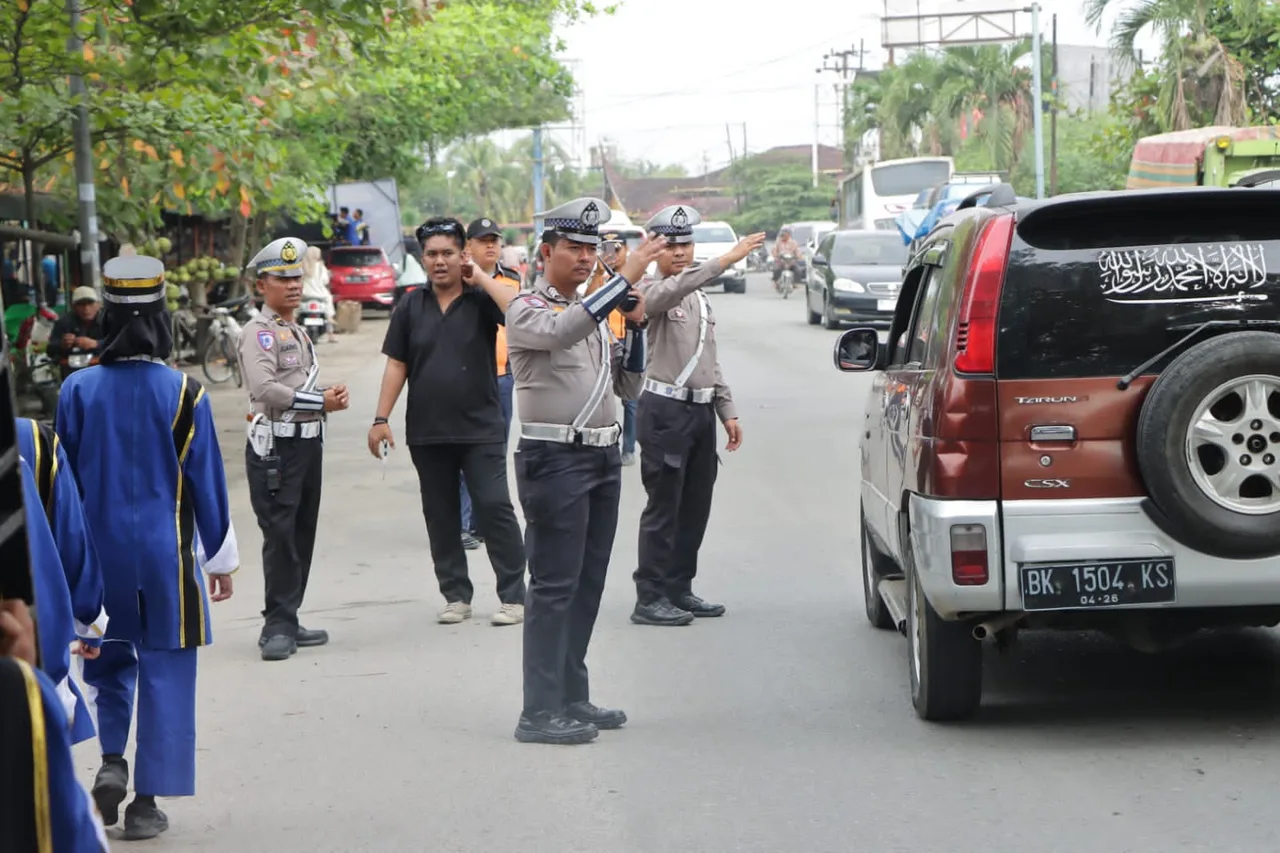 Open Marching Band Tahun 2025 Dilapangan Segitiga personil Polres Sergai Stanby Menjaga